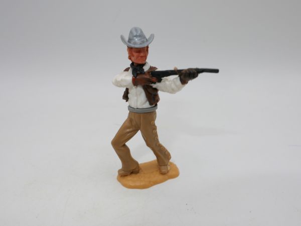 Timpo Toys Cowboy 4. Version stehend, Gewehr schießend - seltener Kopf