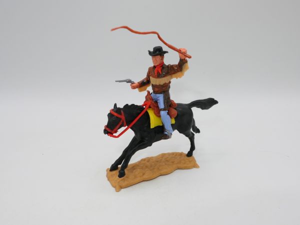 Timpo Toys Cowboy 4. Version reitend mit Peitsche + Pistole