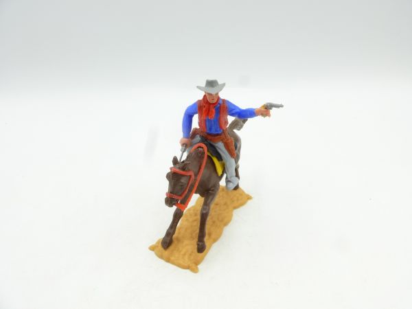 Timpo Toys Cowboy mounted wild with 2 pistols shooting, nice trousers