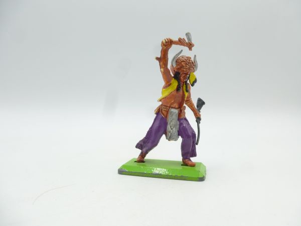 Britains Deetail Medicine man with tomahawk + rifle, purple trousers