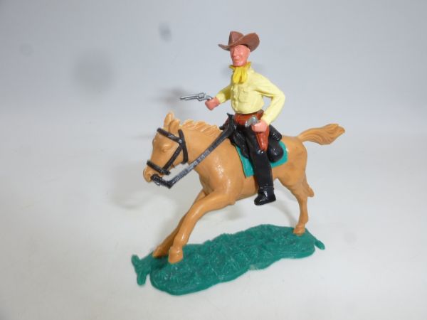 Timpo Toys Cowboy 2. Version reitend mit 2 Pistolen