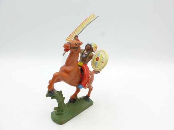 Chief on horseback with spear + shield