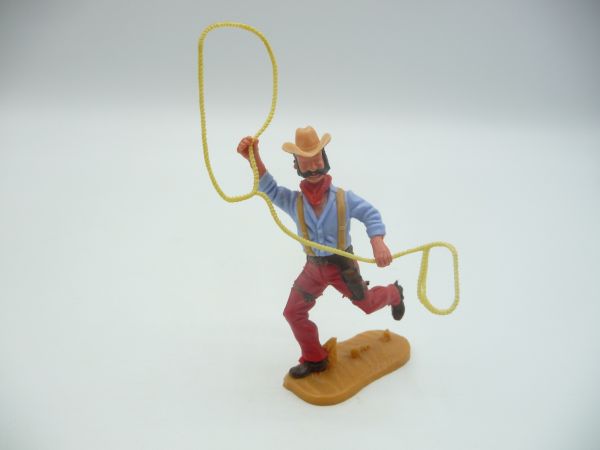 Timpo Toys Cowboy 4. Version laufend mit Lasso, beigefarbene Hosenträger(!)