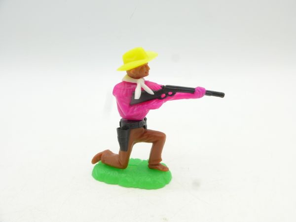 Jean Cowboy kneeling shooting