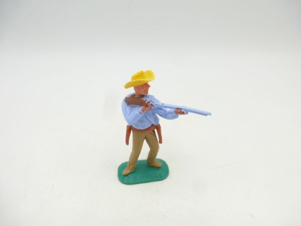 Timpo Toys Cowboy 1. Version, hellblau, Gewehr schießend