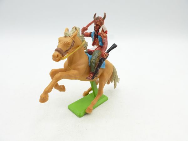 Britains Deetail Indian riding with tomahawk + rifle