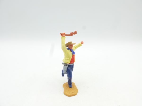 Timpo Toys Cowboy 2. Version laufend, mit Gewehr schlagend