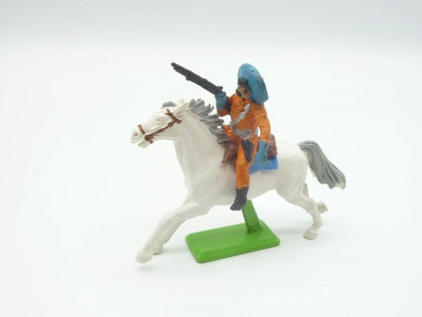 Britains Deetail Mexican on horseback, rifle on shoulder, orange/blue