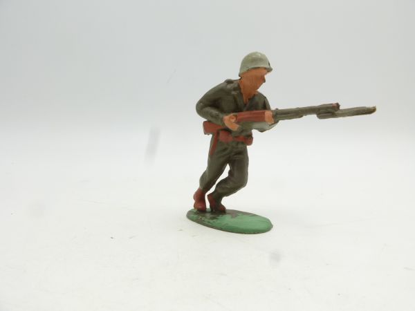Timpo Toys Soldier attacking with rifle