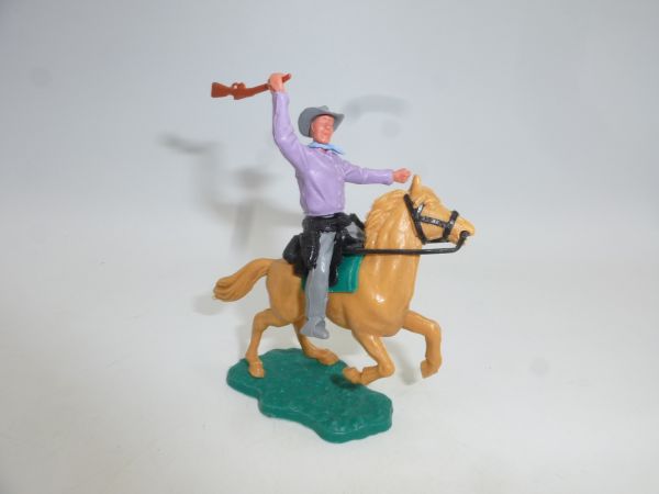 Timpo Toys Cowboy 2nd version riding, striking rifle