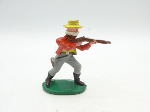 Cowboy standing shooting, red shirt