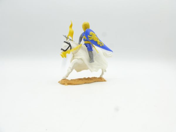 Timpo Toys Medieval knight medium blue/yellow riding with flag
