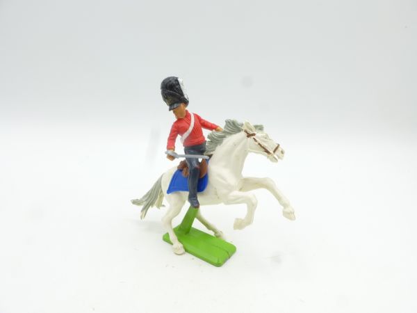 Britains Deetail Waterloo: Soldier on horseback, holding sabre below, red uniform