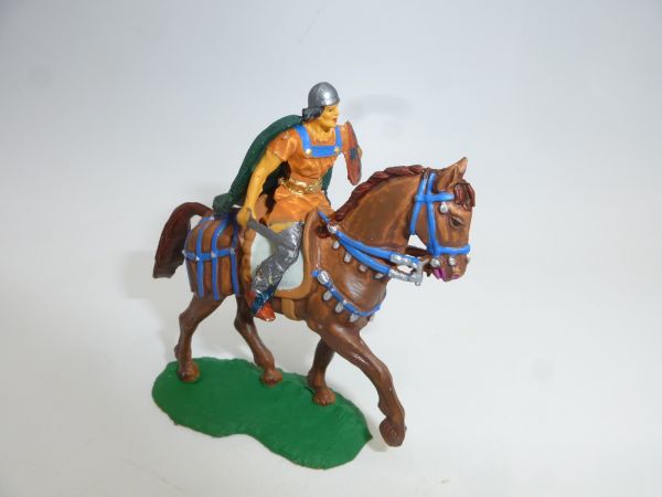 Norman riding with shield, sword + cape