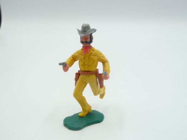 Timpo Toys Cowboy laufend, 2 Pistolen schießend, großer Kopf