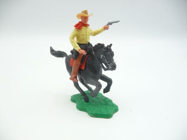 Timpo Toys Cowboy 2. Version reitend, Pistole schießend - frühes Pferd