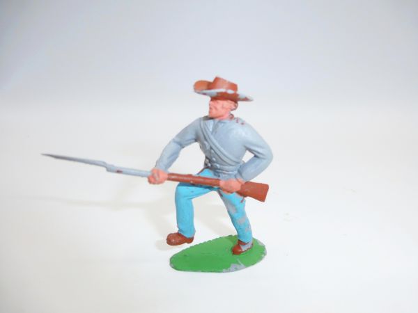 Timpo Toys Confederate Army soldier going forward with bayonet