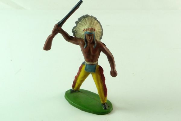Merten Indian standing, holding rifle up No. 215