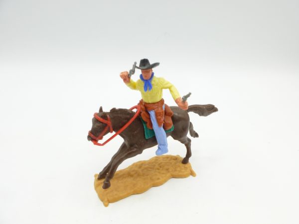 Timpo Toys Cowboy riding, firing wild with 2 pistols - nice base plate