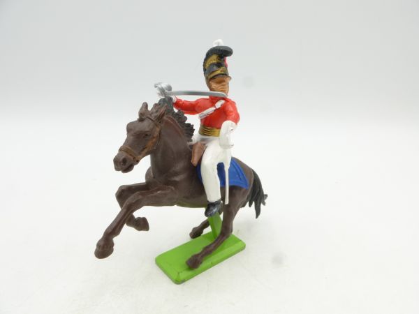 Britains Deetail Waterloo soldier riding, red uniform, sabre in front of body