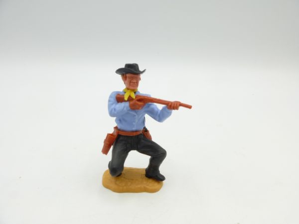 Timpo Toys Cowboy 3. Version hockend mit kurzem Gewehr schießend