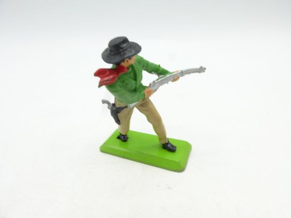 Britains Deetail Cowboy standing, shooting from the hip, deep green shirt