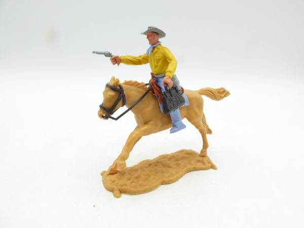 Timpo Toys Cowboy 2nd version riding with pistol + moneybag