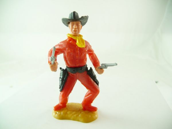 Timpo Toys Cowboy mit seltenem Unterteil in durchscheinendem Rot