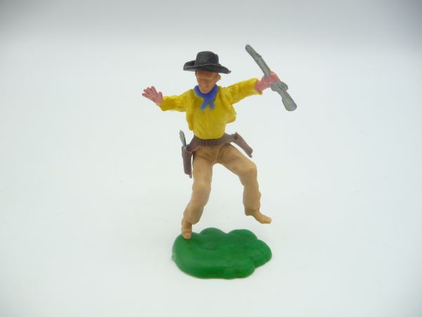 Cowboy jumping with rifle (similar to Swoppets)