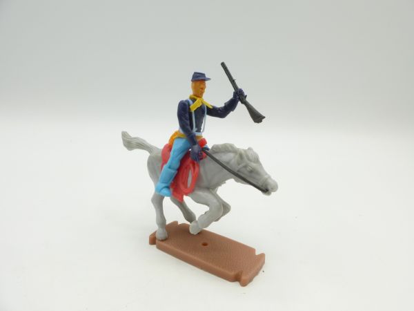 Plasty Union Army soldier riding, holding up rifle