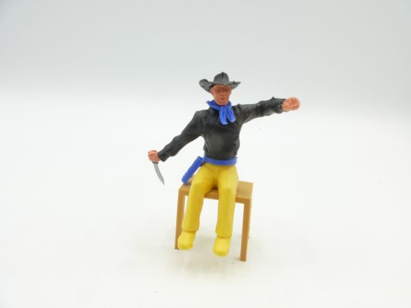 Timpo Toys Cowboy 2nd version sitting with knife (without chair)