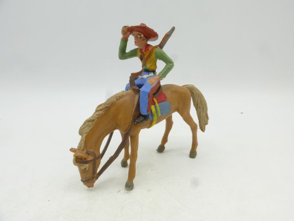Merten Cowboy on horseback peering, horse grazing - rare