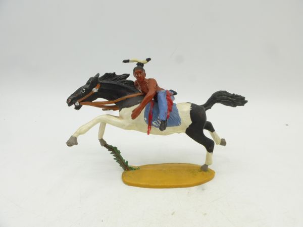 Merten Indian sideways on horse