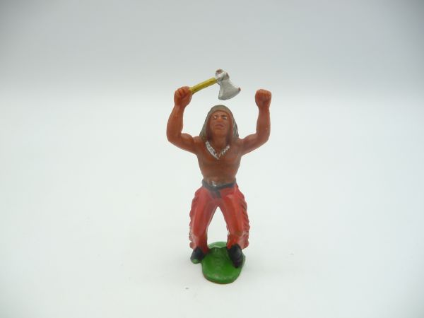 Indian dancing with tomahawk, red trousers
