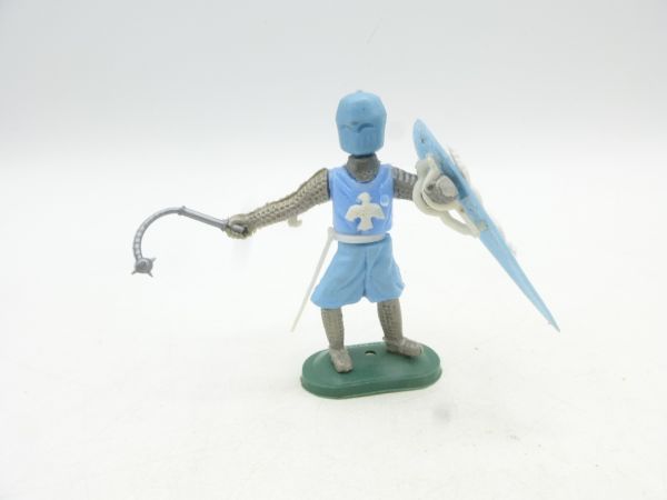 Medieval knight standing with morning star, light blue