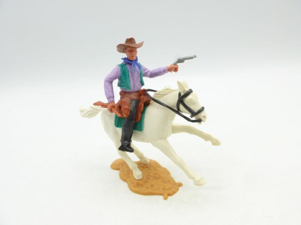 Timpo Toys Cowboy reitend mit Gewehr und Pistole