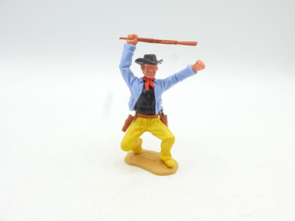 Timpo Toys Cowboy 3. Version hockend, Gewehr schlagend
