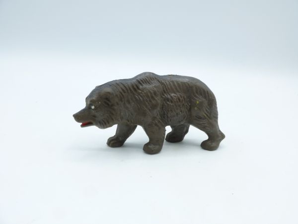Grizzly walking - in rare dark brown