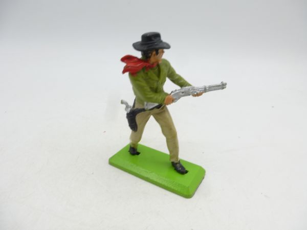 Britains Deetail Cowboy, shooting rifle from the hip, lime green
