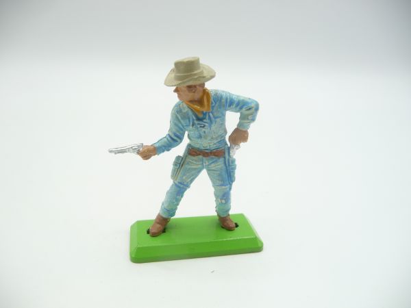 Britains Deetail Cowboy standing, firing / pulling pistol (light blue)