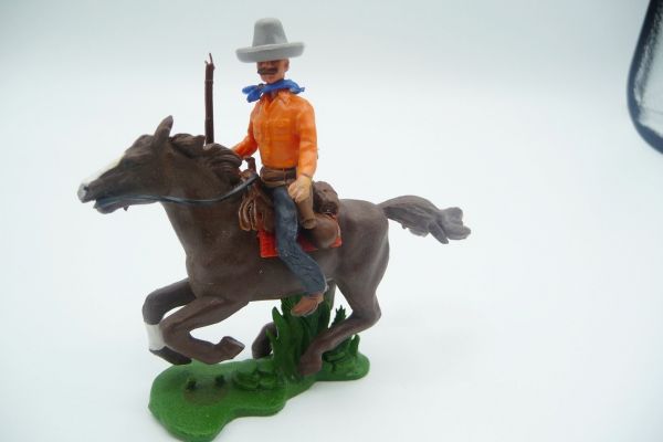 Britains Swoppets Cowboy riding, rifle sideways - brand new