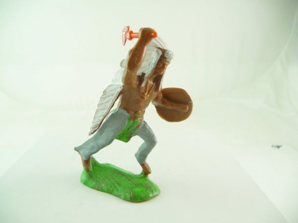 Reisler Indian chief running with tomahawk + shield