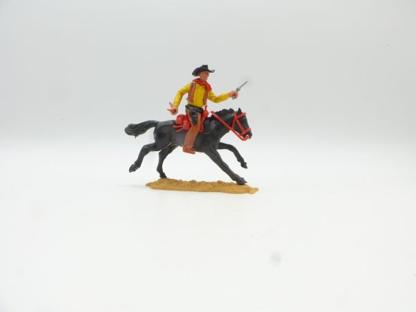 Timpo Toys Cowboy 2nd version riding with pistol + rifle - great colour combination