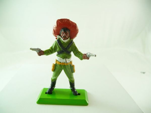 Britains Deetail Mexican firing with 2 pistols, green / sombrero red