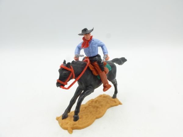 Timpo Toys Cowboy mounted with 2 pistols