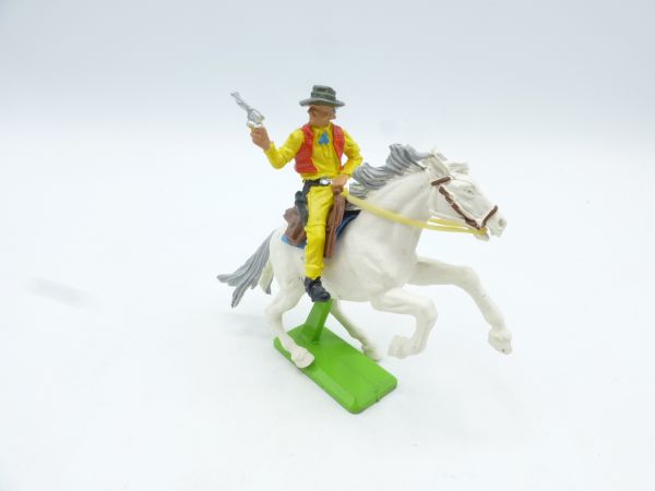 Britains Deetail Cowboy riding, firing pistol sideways