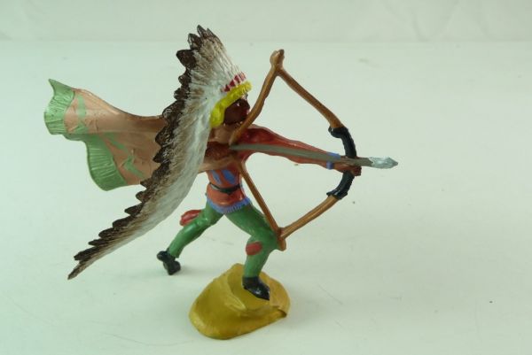 Merten Indian Chief with cape, standing on stone, shooting with bow