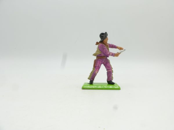 Britains Deetail Cowboy standing, shooting pistol ambidextrously, purple