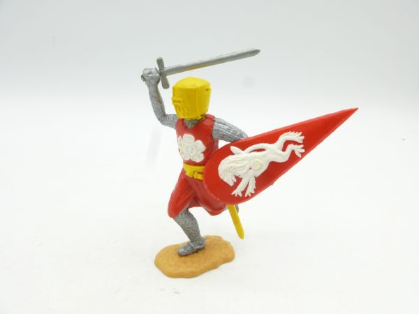 Timpo Toys Mittelalterritter laufend mit Schwert, rot, gelber Kopf