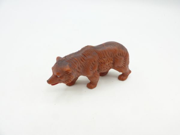 Brown bear with silver back running